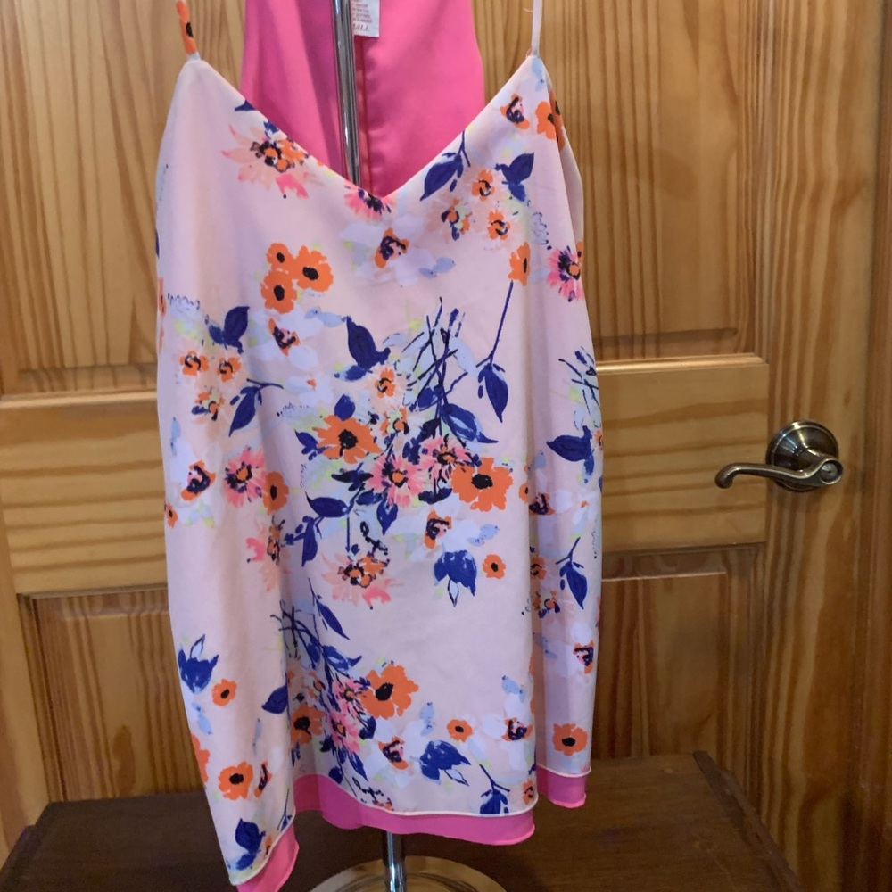 Candies!!!  100% polyester, reversible, colorful, size Small.